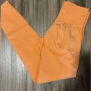 NVGTN Orange Leggings